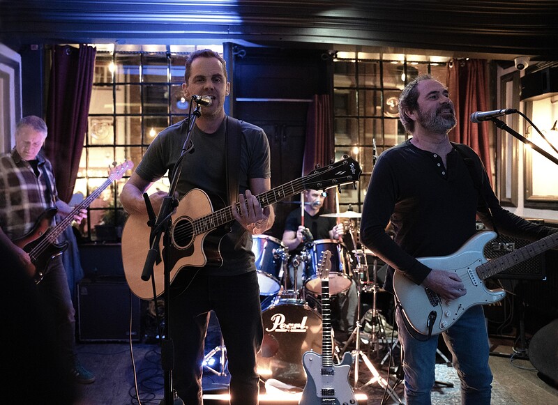 Three Scots and a Barman at Mr Wolfs