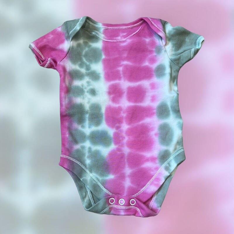 Tie-dye babygros and t-shirts at Skyboat Cafe