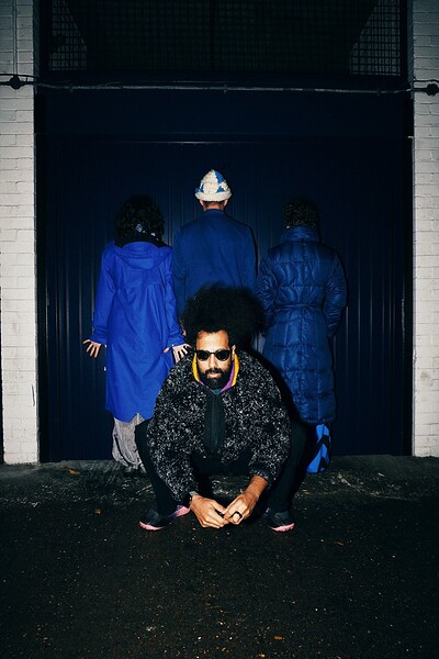 Reggie Watts x CAPYAC playthecube: Touch, 4 Spoons Holding The Chair Akimbo at The Cube
